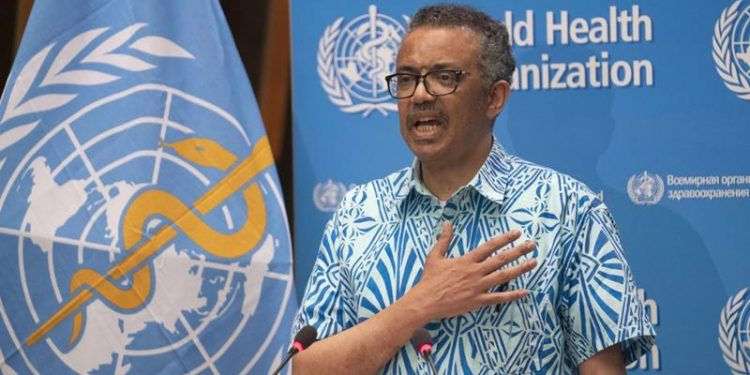 WHO head says he will keep leading virus fight after Trump threat